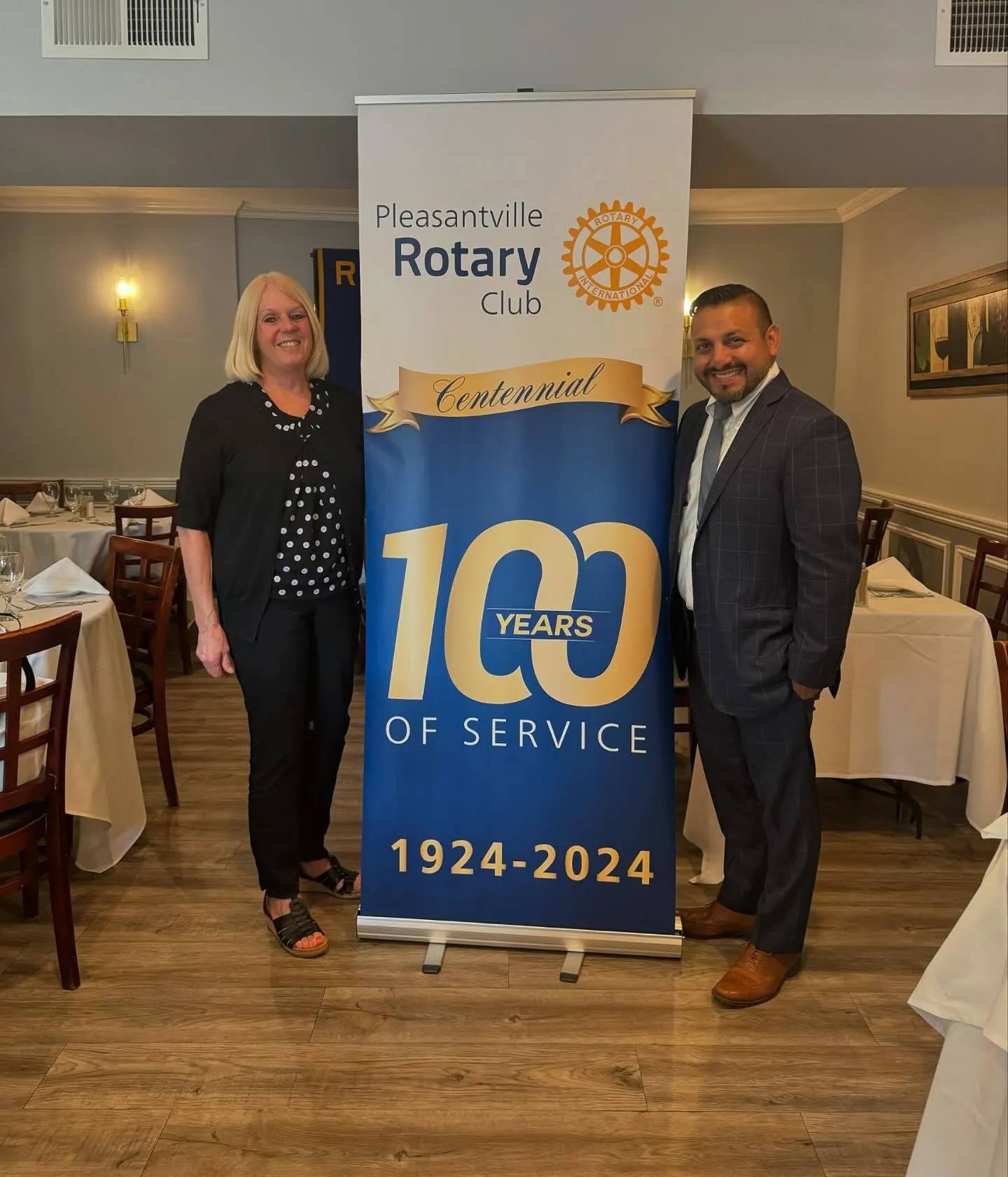 Members with the 100 Years of Service banner