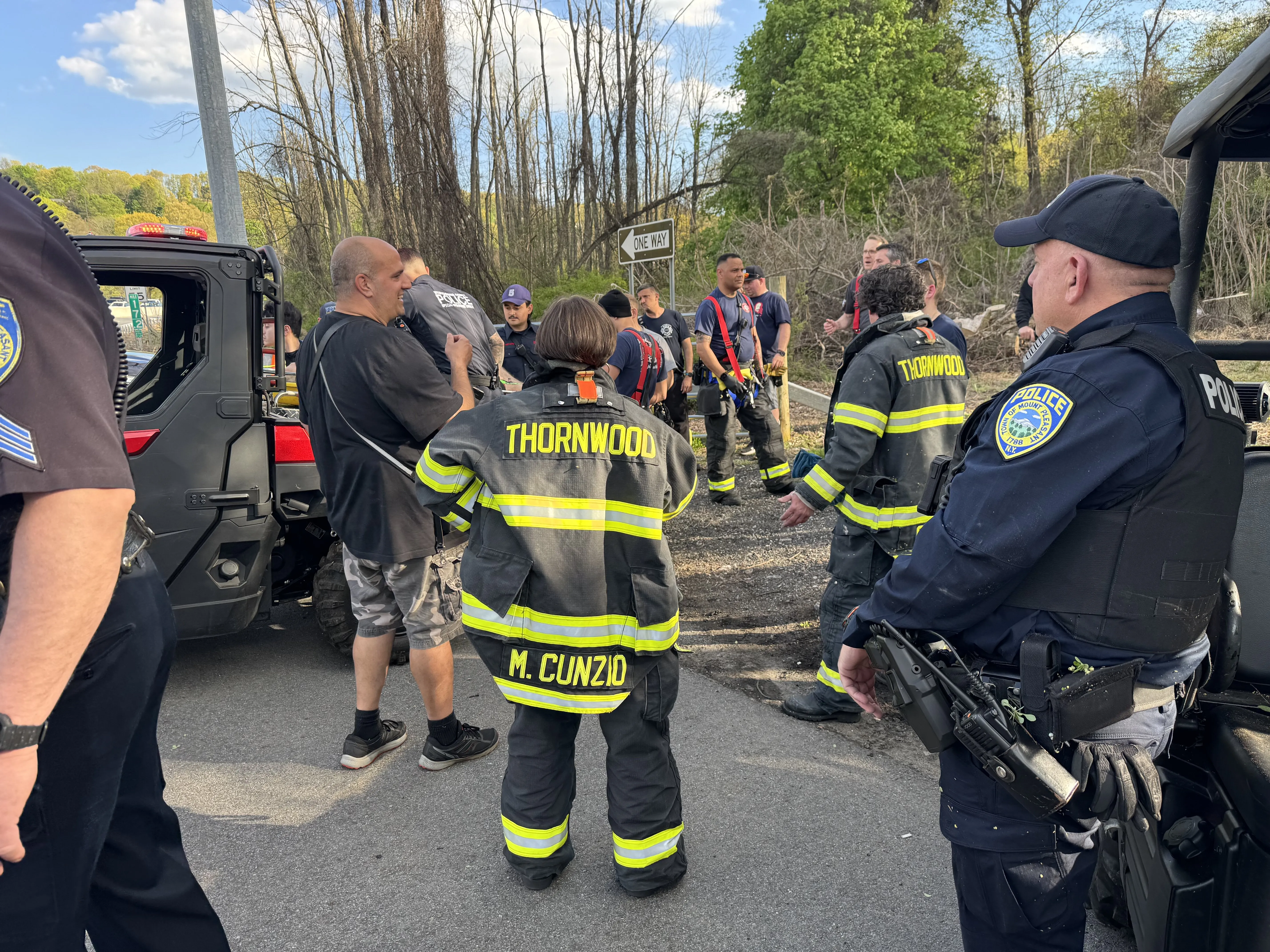 Margaret Cunzio in Thornwood Fire Department turnout gear at an emergency scene with police and firefighters