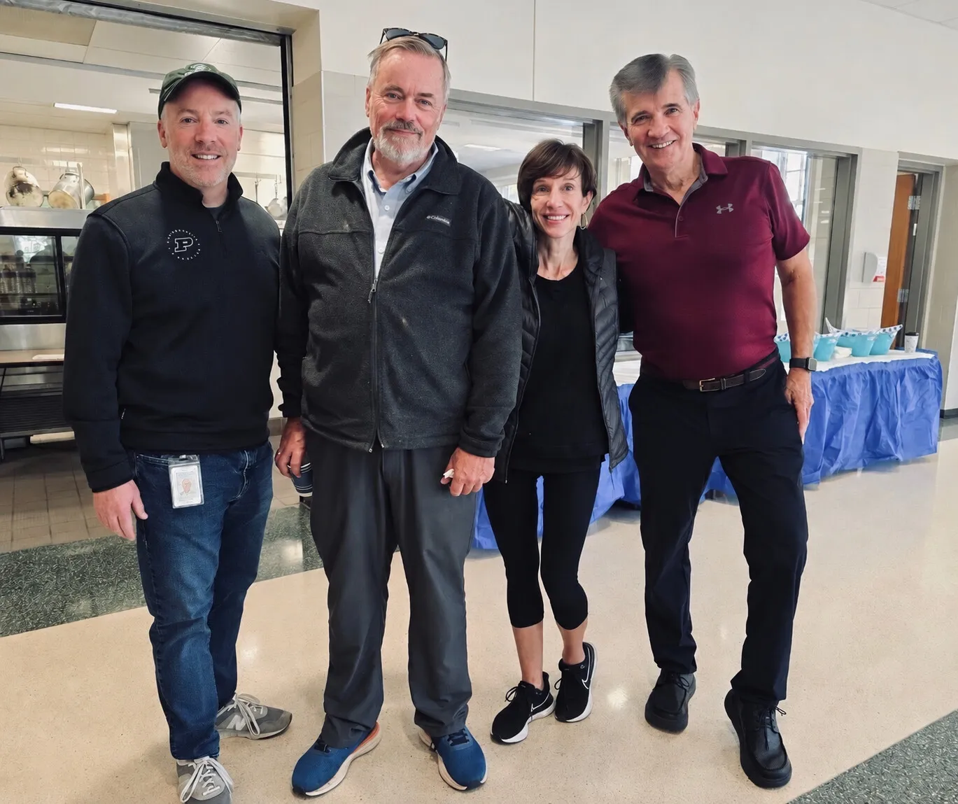 Four greeters standing together at the 2026 Pancake Breakfast